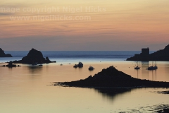Dusk view of New Grimsby Harbour, Tresco, Isles of Scilly.
