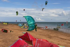 Kite-surfing and windsurfing at Exmouth, Devon, Great Britain.
