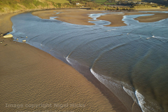 Aerial view of Burgh Island, Bigbury and the estuary of the River Avon, south coast of Devon, Great Britain.