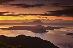 Dawn over Taal Lake and Taal volcano, seen from Taal Vista Hotel, Tagaytay, Calabarzon, Luzon, Philippines.