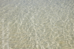 A white sand coral beach against azure sea, Havodda Island, in Gaafu Dhaalu atoll, in the far south of the Maldives, Indian Ocean.
